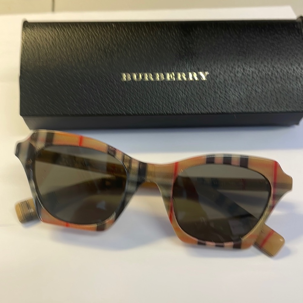Authentic Burberry sunglasses with case.  No scratches on lens